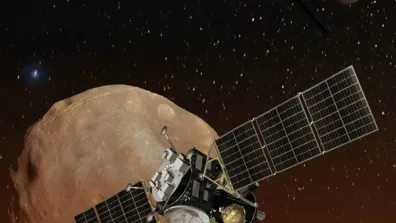 Vue d’artiste de la sonde japonaise MMX devant Phobos et Deimos