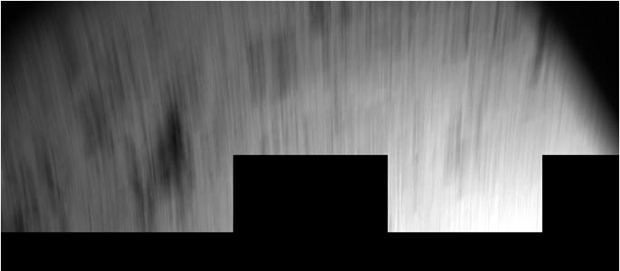 Cette image CIVA a été prise par CIVA juste après le 1er rebond alors que Philae était en mouvement, ce qui explique son aspect filé. Un traitement approprié devrait permettre de révéler quelques détails à la surface. Crédits : ESA/Rosetta/...