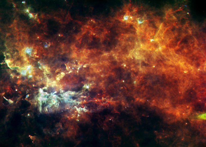 Chaîne de production d&#039;étoiles dans la constellation du Petit Renard. Crédits: ESA/Hi-GAL Consortium.