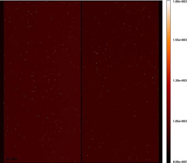 Acquisition de la première image d&#039;obscurité des CCD. Les points brillants sont des &quot;pixels chauds&quot;, présentant un signal de fond plus élevé que leur voisin. On y voit également des impacts de radiations. Image acquise le 3 janvier.